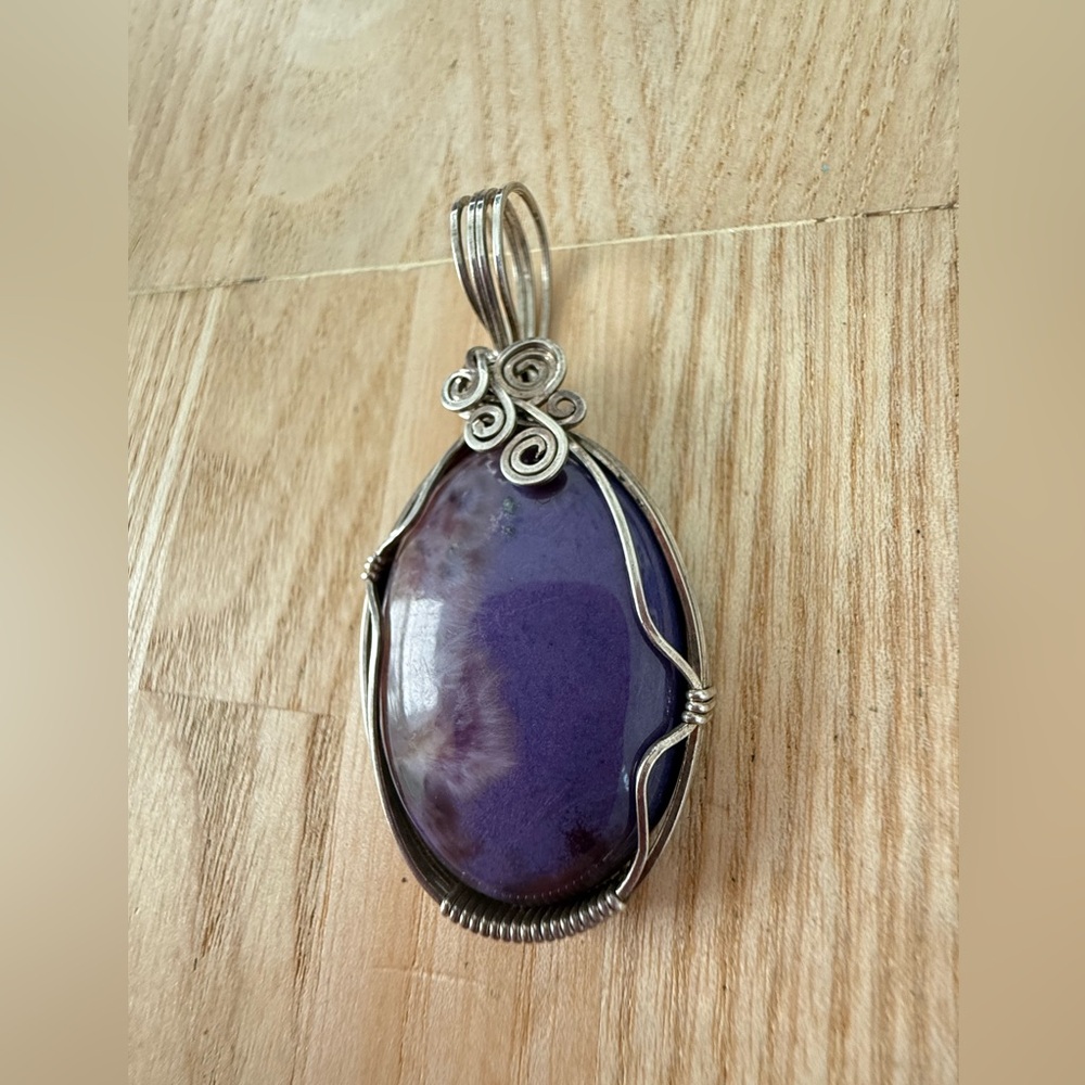 Artisan silver wire wrapped purple stone pendant